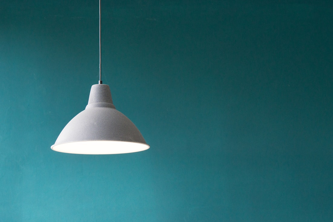 Modern pendant lighting installed in a clean interior